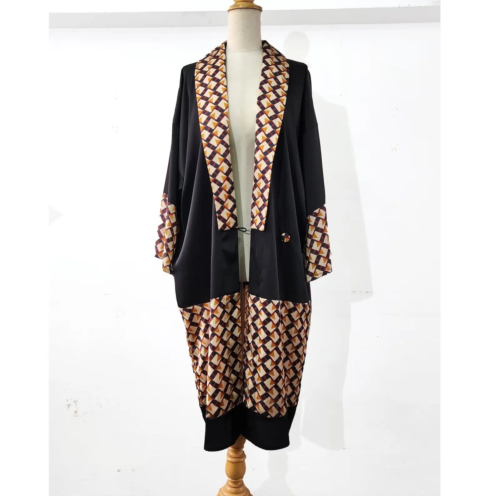 Satin kimono robe with shawl lapel in black and brown geometric print